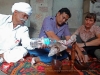 120806-01251-in-jodhpur-bishnoi-village-patriarch-preparing-opium-for-guests-sanjay-susan